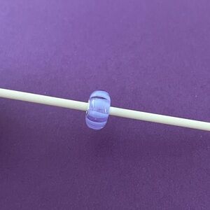 Trollbeads Retired Lavender stripe bead. TGLBE-10249.